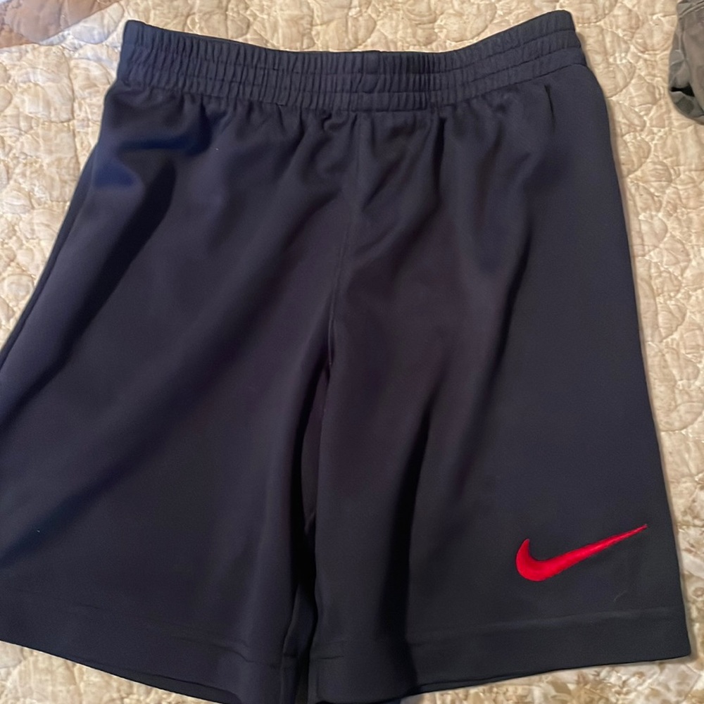 Little boy navy Nike shorts. S (5-6years)